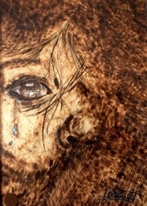 30 x 40 cm tableau_pyrogravure_inspire_tristesse_bd